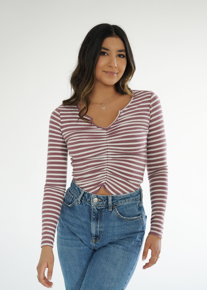 Front view of model wearing the Isabelle top in Maroon and white stripes