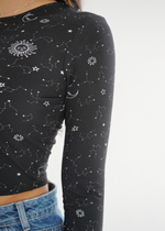 close up front view of model wearing Sabrina shirt in Constellations print