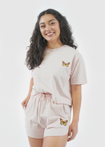 Front of model wearing Redondo boxy crop tee in butterfly rose