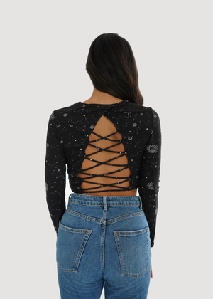 
                  
                    Back view of model wearing Sabrina shirt in Constellations print
                  
                