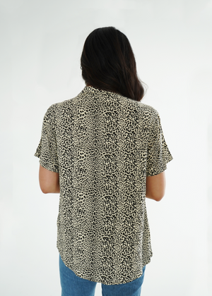 
                  
                    Back view of model wearing leopard print Sydney shirt untucked
                  
                