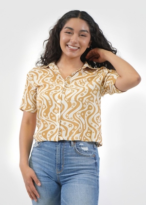 
                  
                    Front of model wearing James cropped shirt in Flower Power Brown print
                  
                