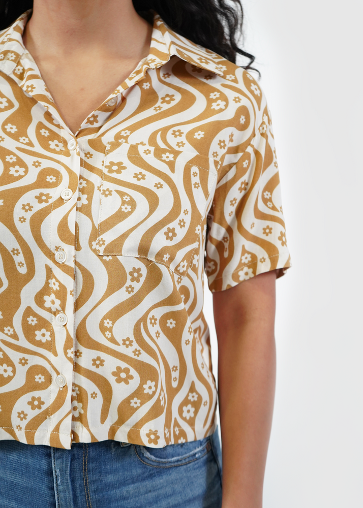 
                  
                    Close up of James cropped shirt in Flower Power Brown print
                  
                