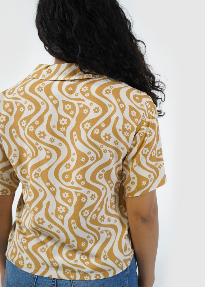 
                  
                    Back of James cropped shirt in Flower Power Brown print
                  
                