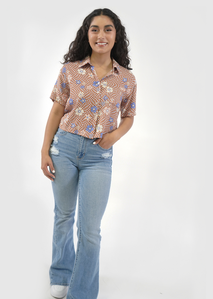 Front of model wearing James cropped shirt in groovy summer print
