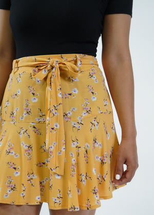 
                  
                    Close up of Milly tiered skirt in Golden Bouquet
                  
                