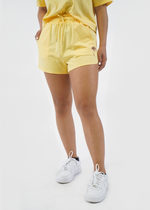 Front of model wearing Redondo shorts in golden rays