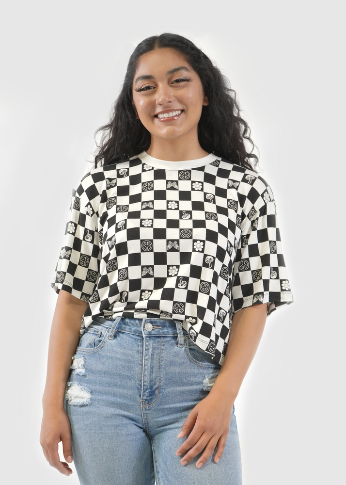 Front of model wearing Allie tee in black checkerboard print