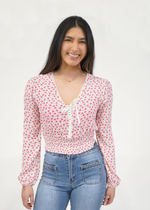Front of model wearing Addison blouse in Cherry Blossom print