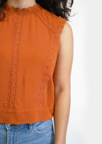 Close up of model wearing Victoria Lace tank in Apricot