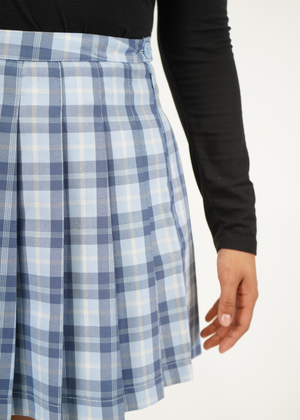 
                  
                    Close up of model wearing Olivia pleated skirt in Zen Blue Plaid
                  
                