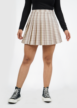 
                  
                    Front of model wearing Olivia pleated skirt in Iced Coffee Plaid
                  
                