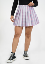 Front of model wearing Olivia pleated skirt in Periwinkle Plaid