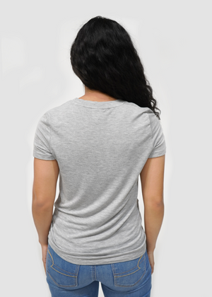 
                  
                    Back of model wearing Venice knot tee in nouveau sun and moon print
                  
                